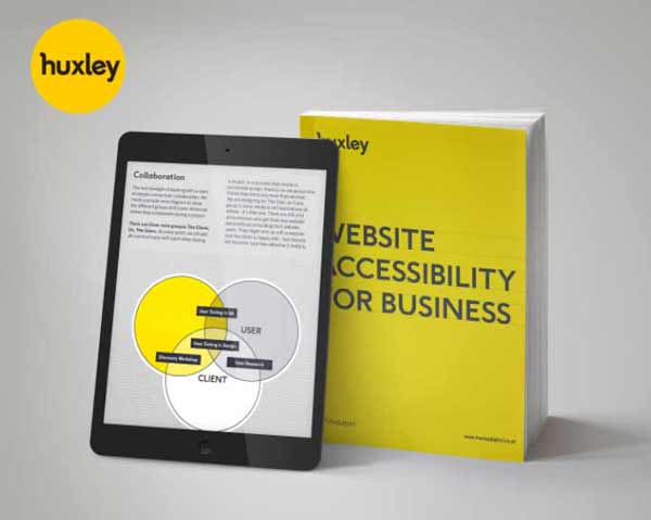 an ipad displaying a page from website accessibility for business by huxley digital resting on a paperback copy of the same book